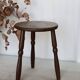 Antique tripod stool in turned wood