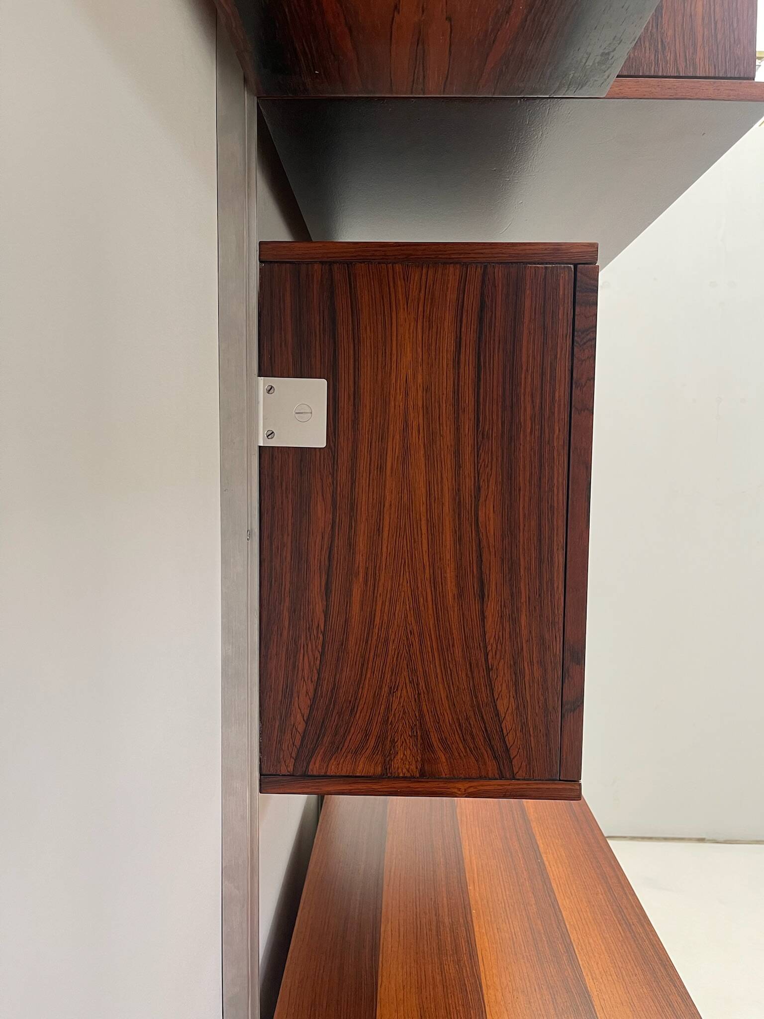 Large colorful wall unit in luxury wood