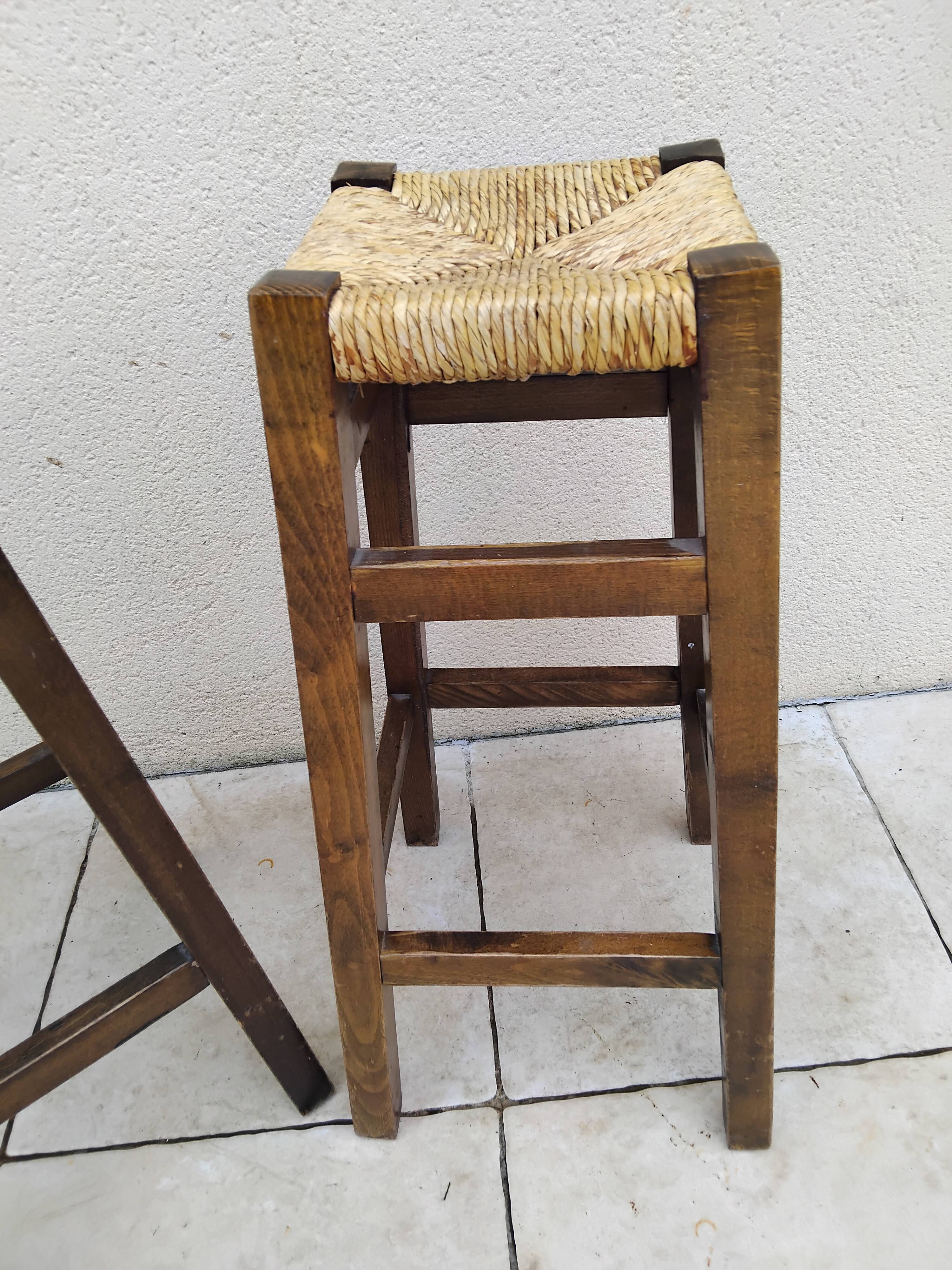 Pair of vintage stools with straw seats