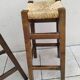 Pair of vintage stools with straw seats