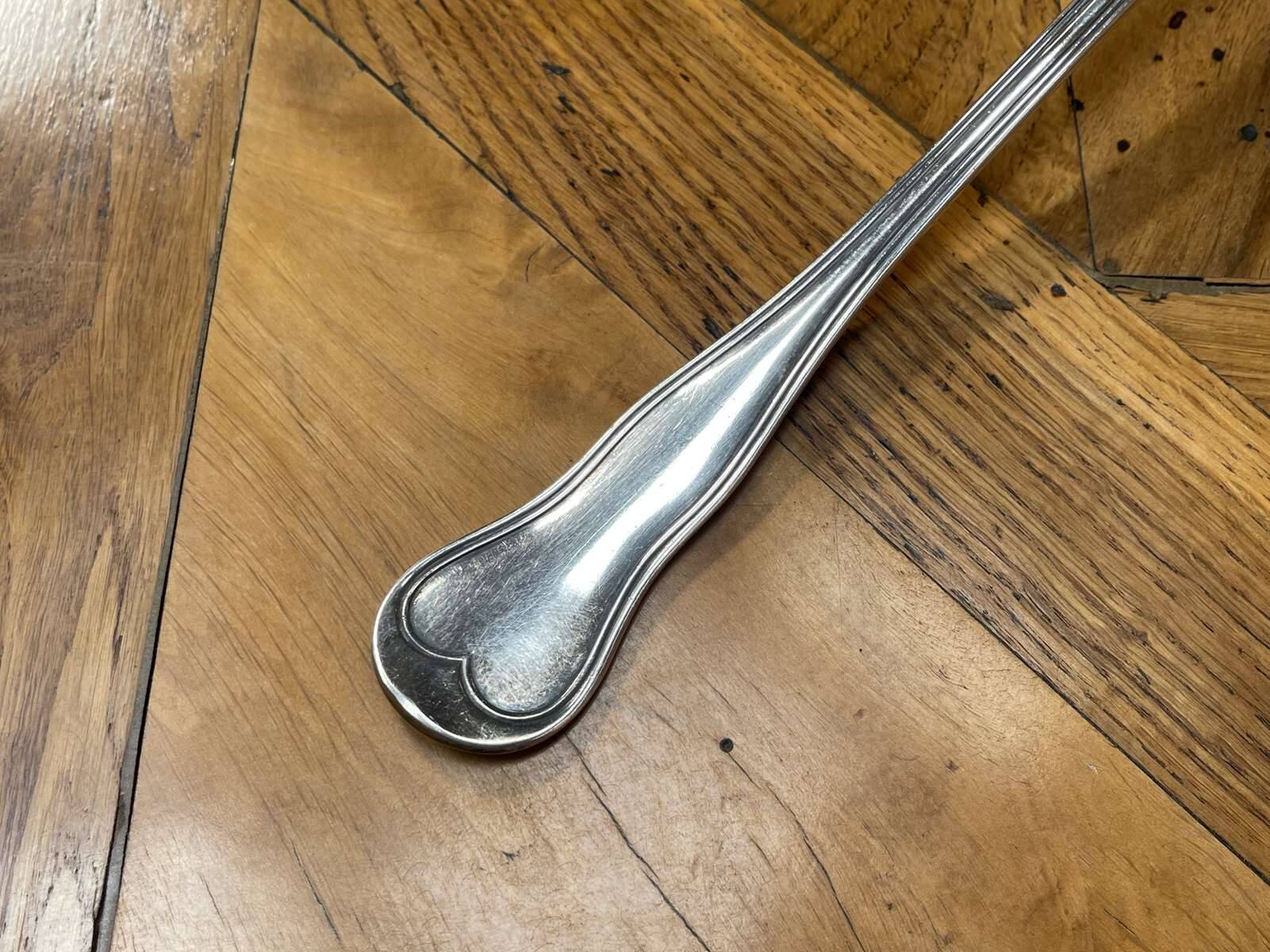 Christofle brand ladle in silver metal - Letter B on the back.