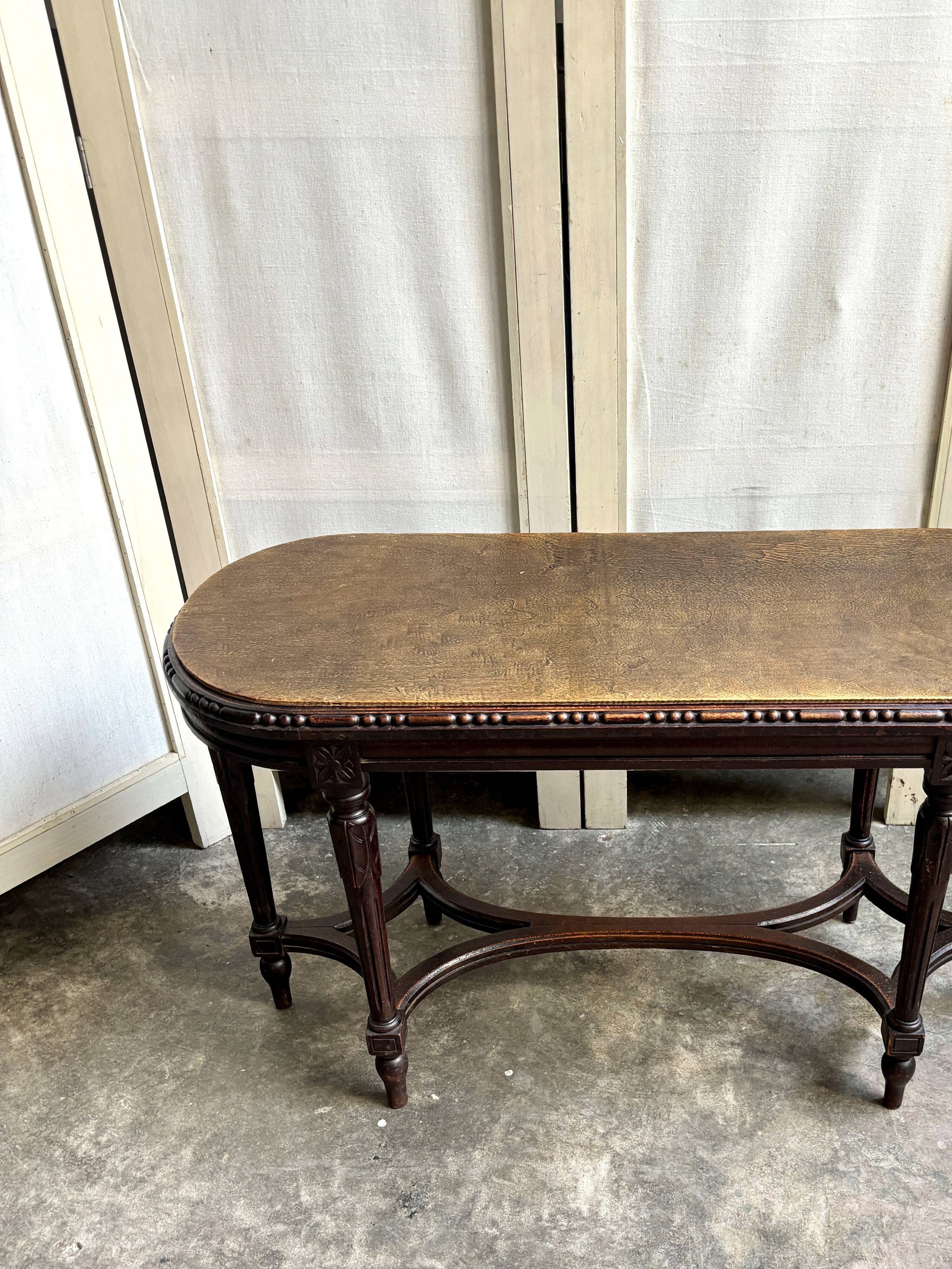 Dark wood piano bench