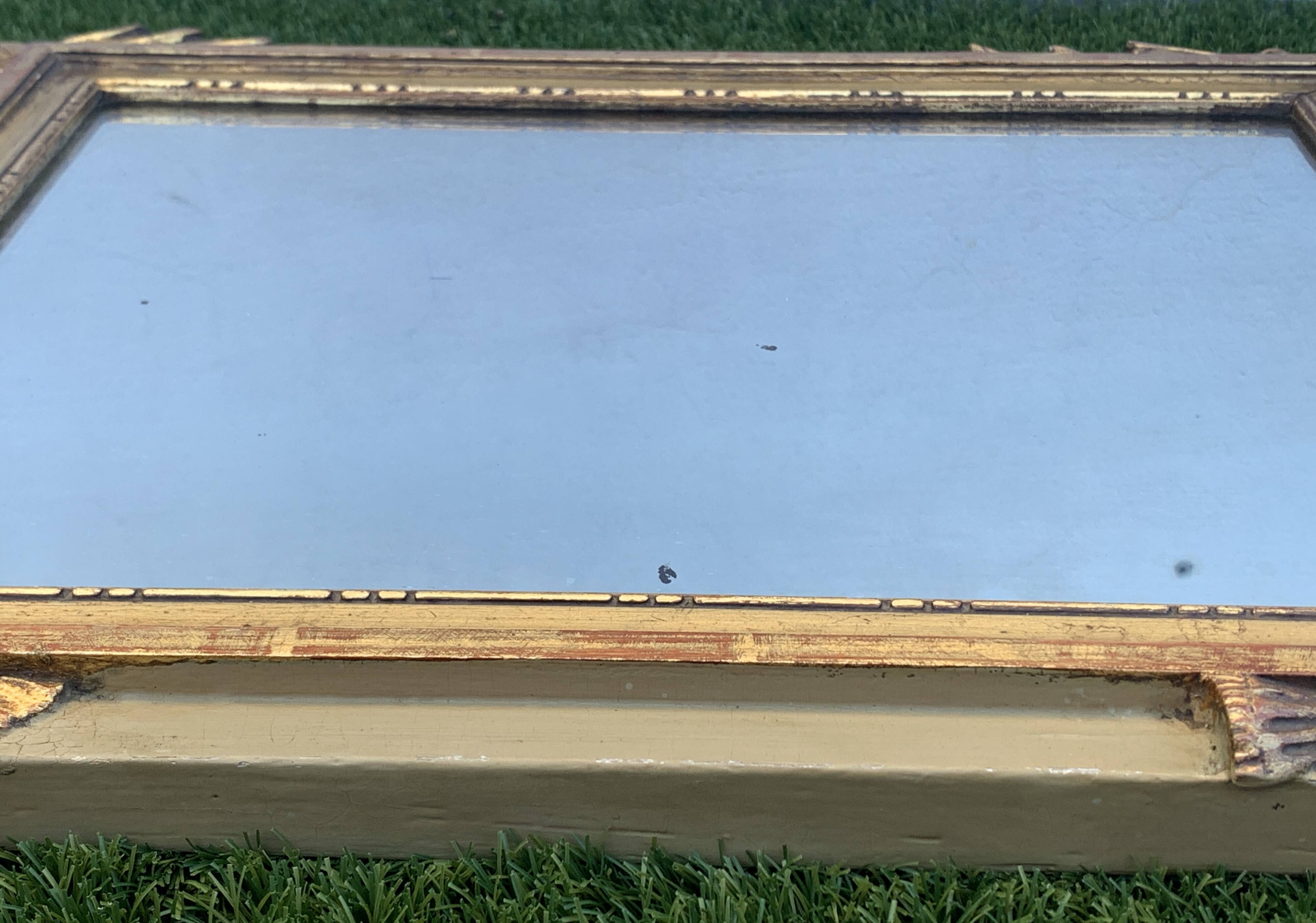 Antique mirror with gilded wood pediment, Louis XVI style