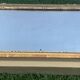 Antique mirror with gilded wood pediment, Louis XVI style