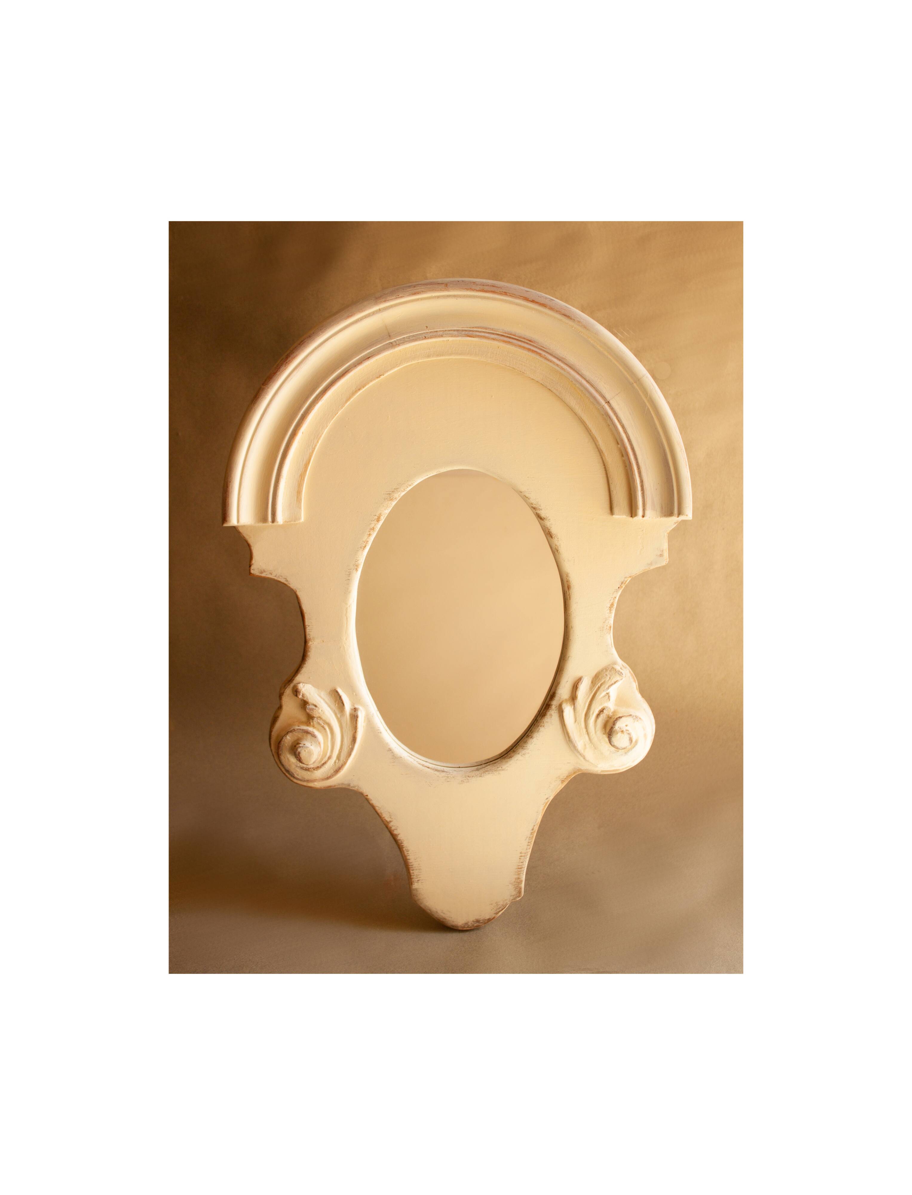 Vintage carved wooden mirror.