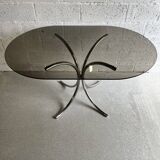 Oval table in smoked glass and chrome steel