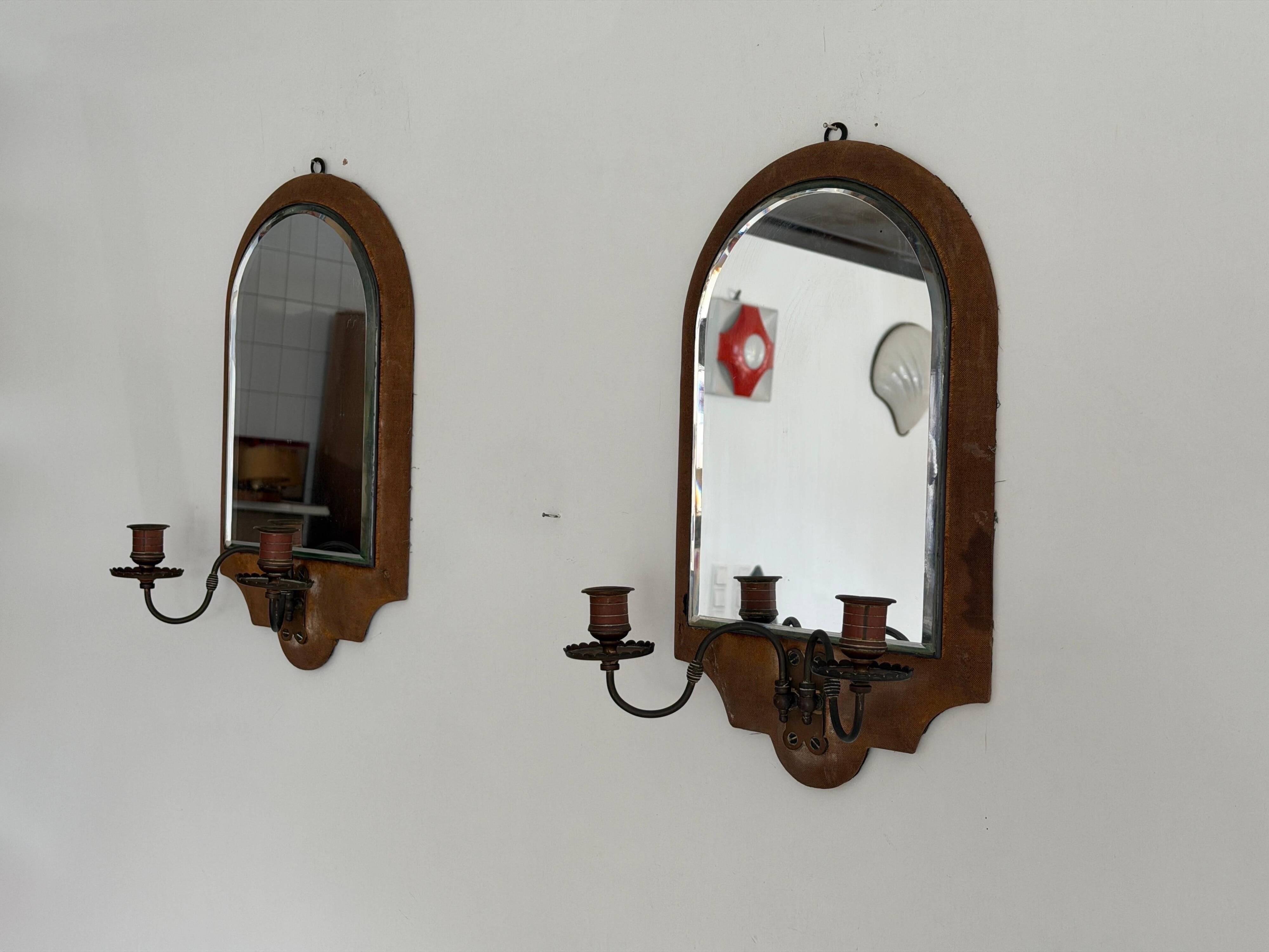 Pair of brass double-headed candlesticks with mirrors, 1940s, Italy
