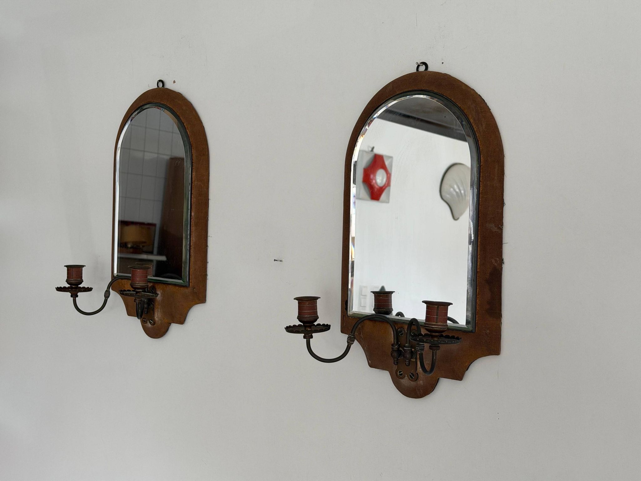 Pair of brass double-headed candlesticks with mirrors, 1940s, Italy