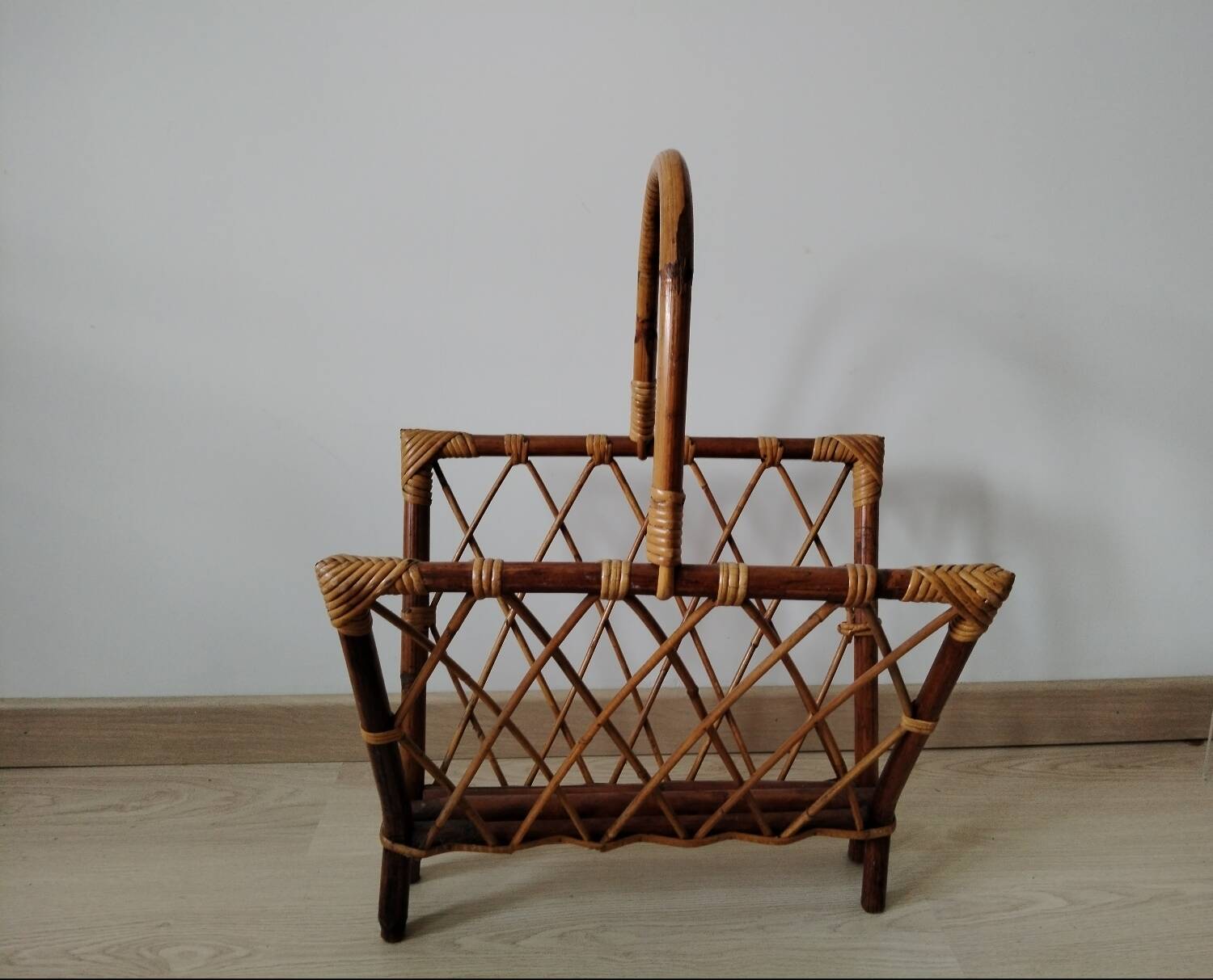Rattan magazine rack from the 1950s