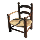 Low straw armchair