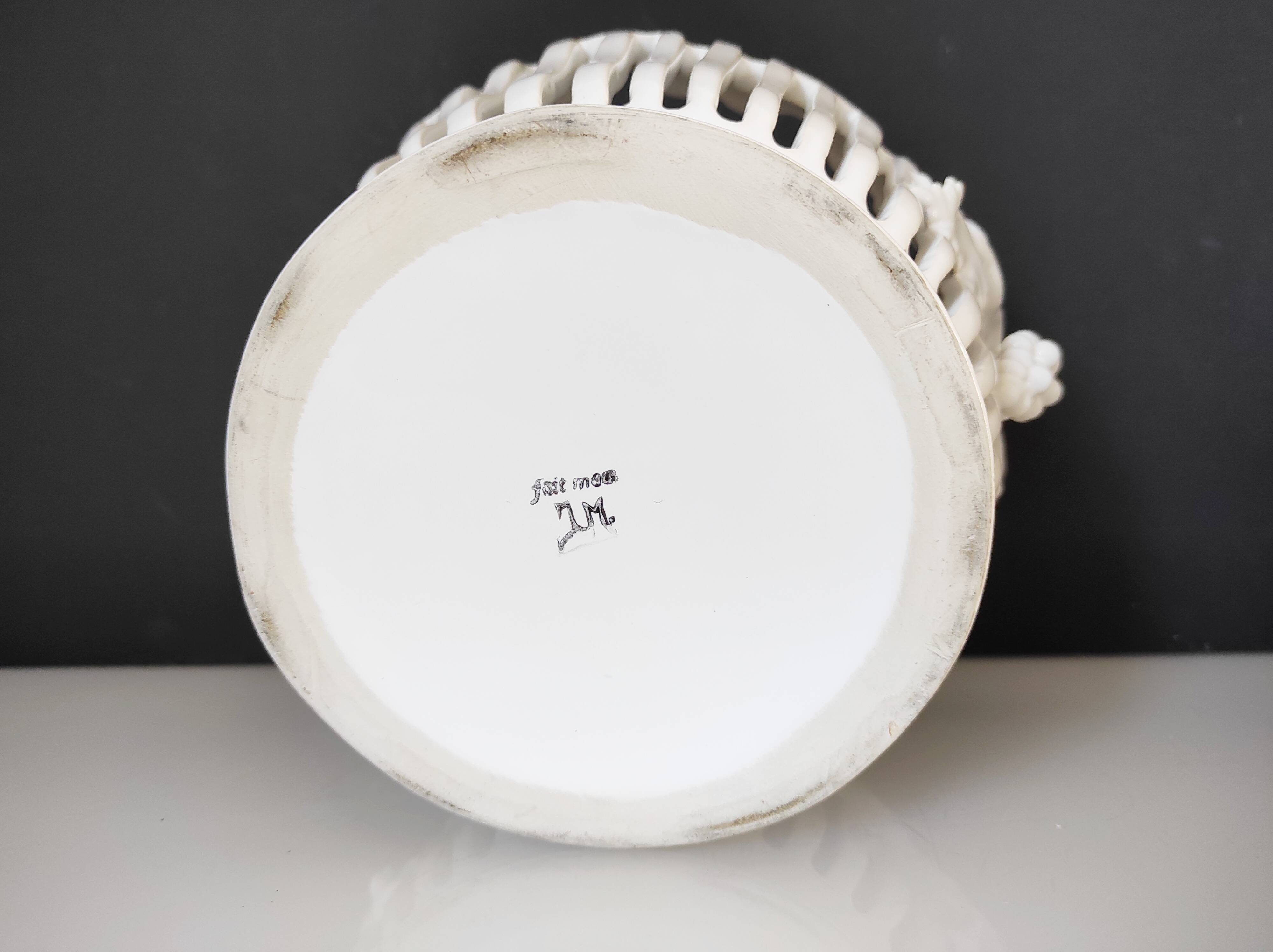 Openwork earthenware fruit bowl with grape decoration