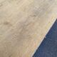 Vintage 1950s oak enfilade buffet with tapered legs.