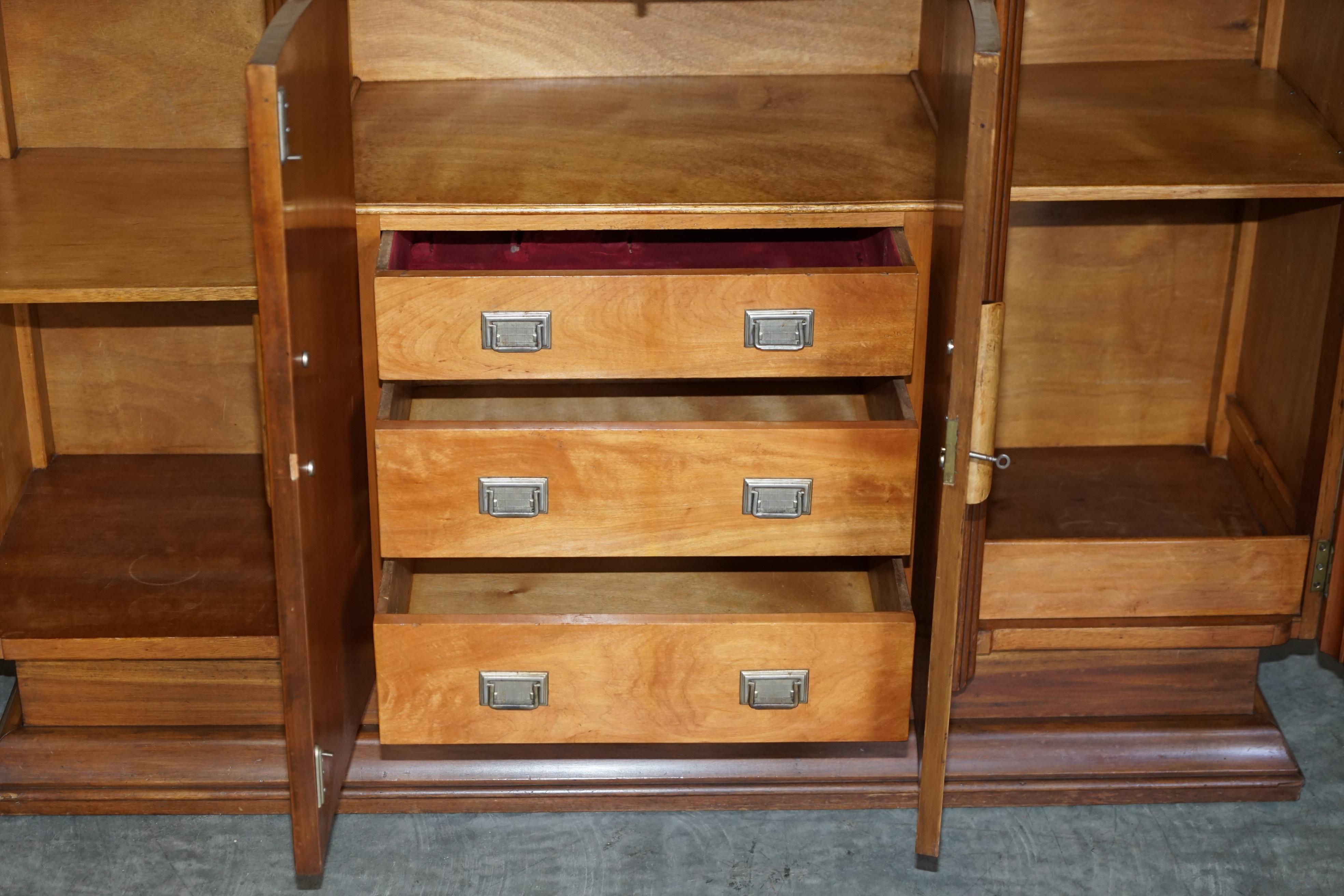 Art Deco walnut burr sideboard with drawers and bar.