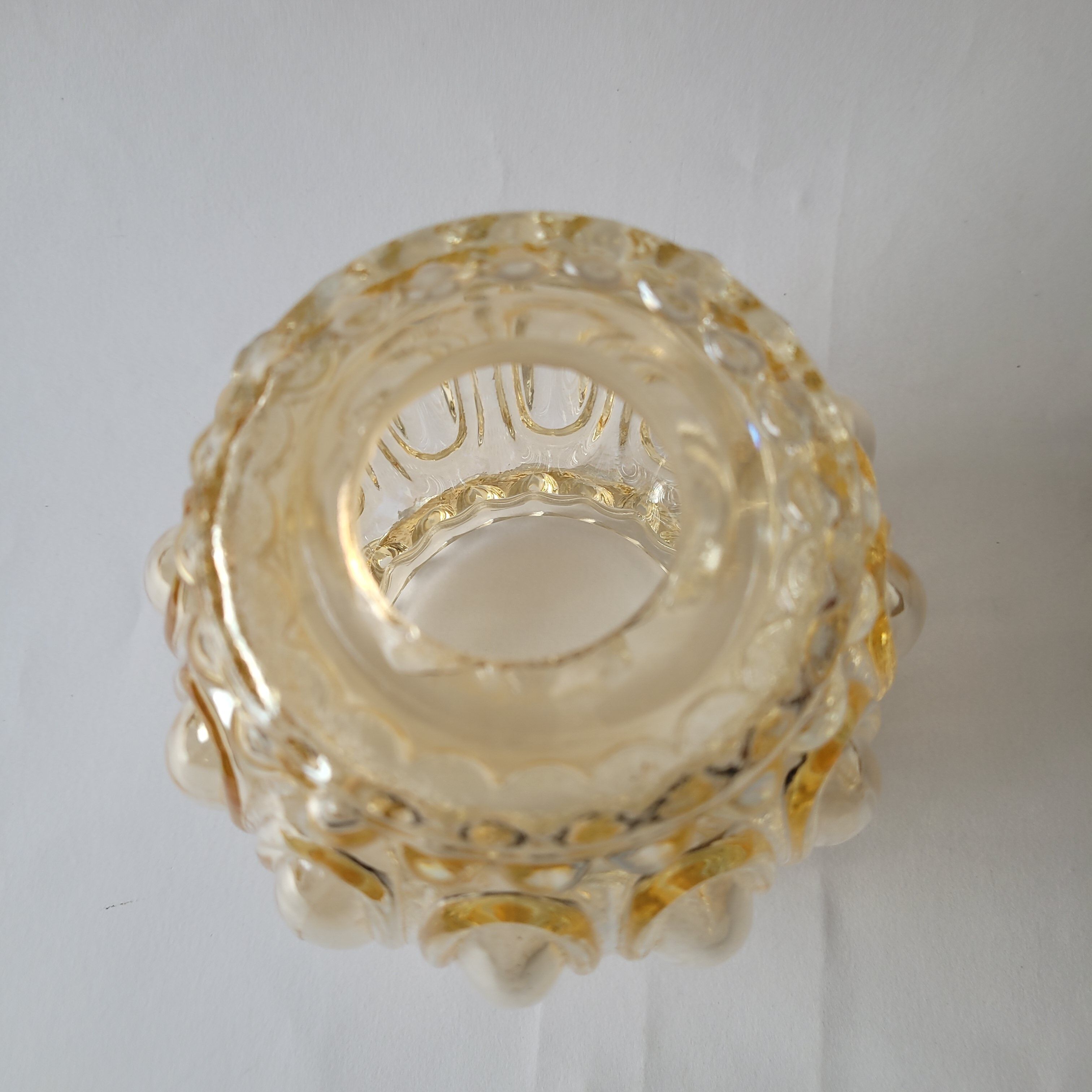 Yellow molded glass globe