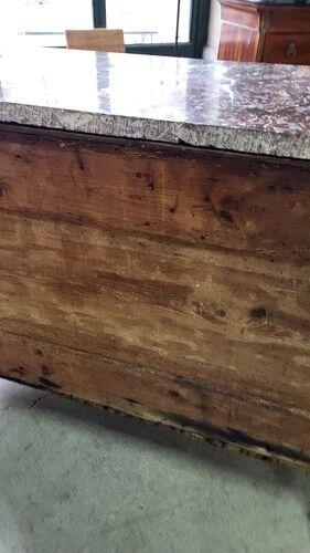Very Louis XV from the 18th century in walnut with a marble top.