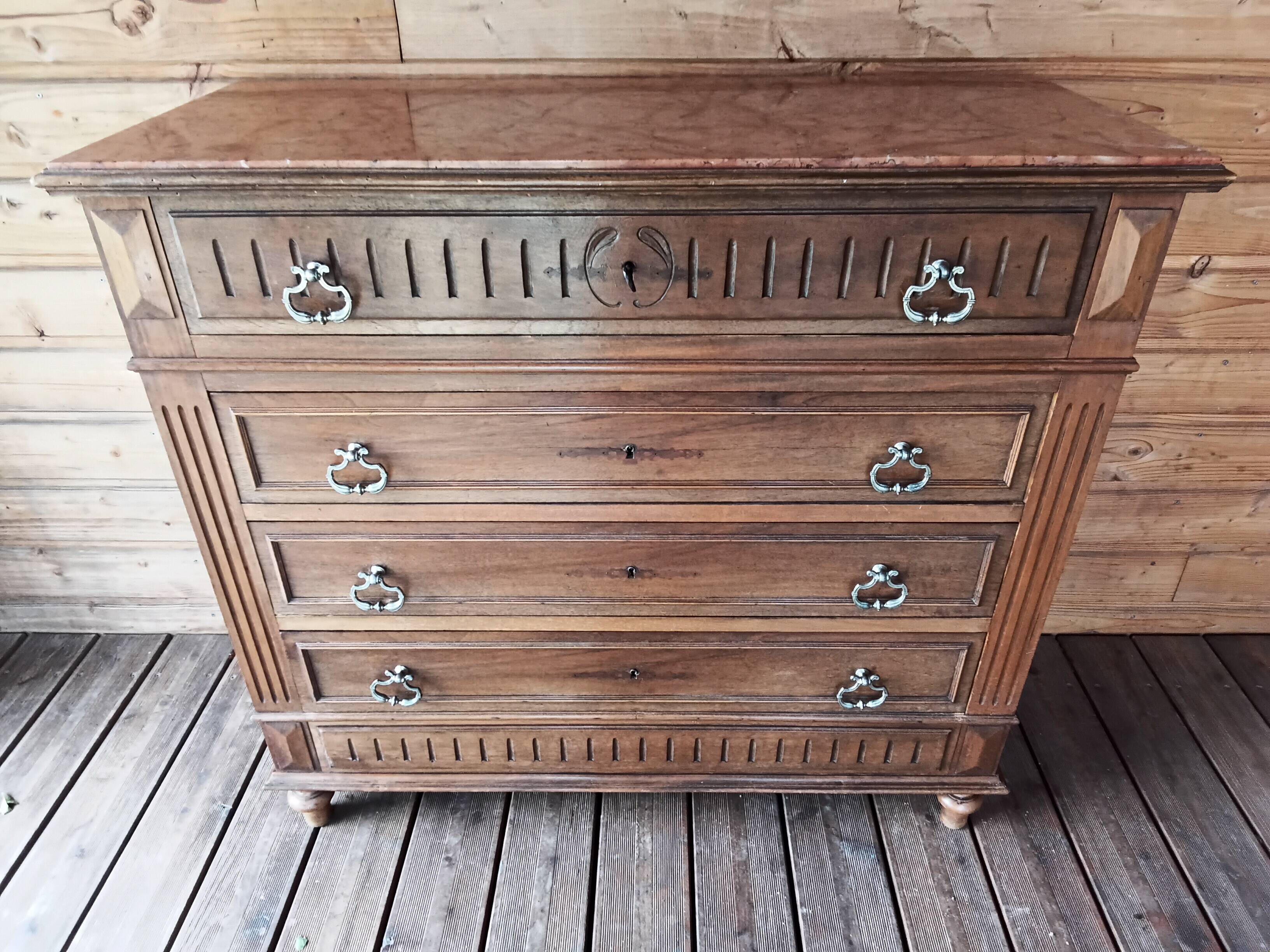 Antique chest of drawers with marble top