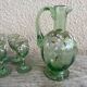 Antique liqueur service, enamelled decanter and glasses.