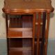 Sheraton-style rotating library table in walnut and satinwood.