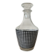 Small black and white checkered carafe with original glass stopper