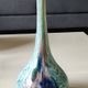 Ball vase soliflore with a long chimney neck. In speckled glass in the Murano style.