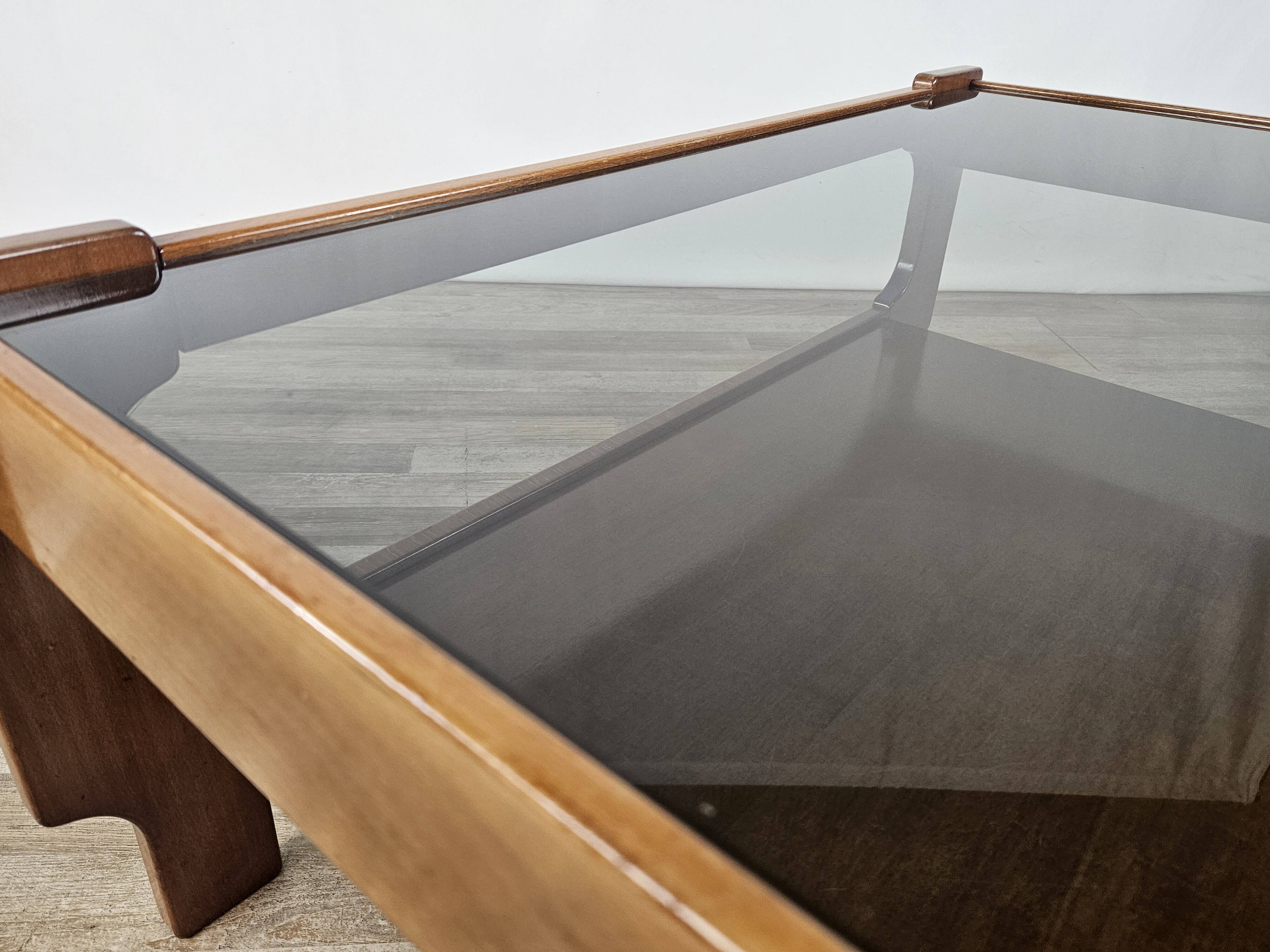 Teak coffee table with smoked glass top