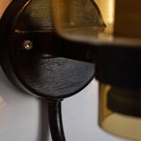 Pair of black metal wall lamps with yellow shades and inner diffuser