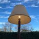 Art Deco floor lamp with wooden shelf and beige lampshade