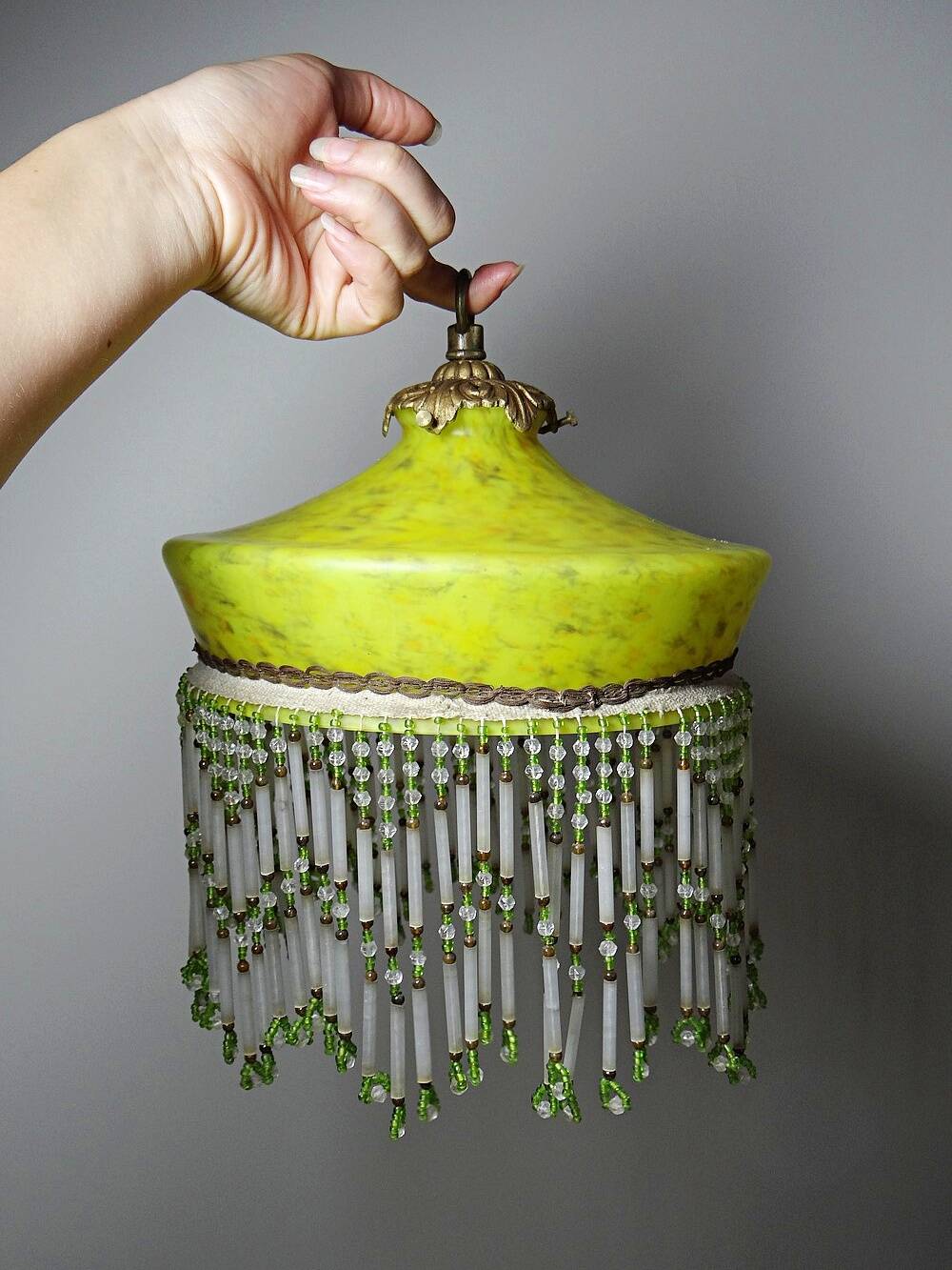 Antique Art Deco lampshade in yellow marbled glass with bead fringes.