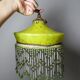 Antique Art Deco lampshade in yellow marbled glass with bead fringes.