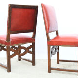 6 red leather chairs