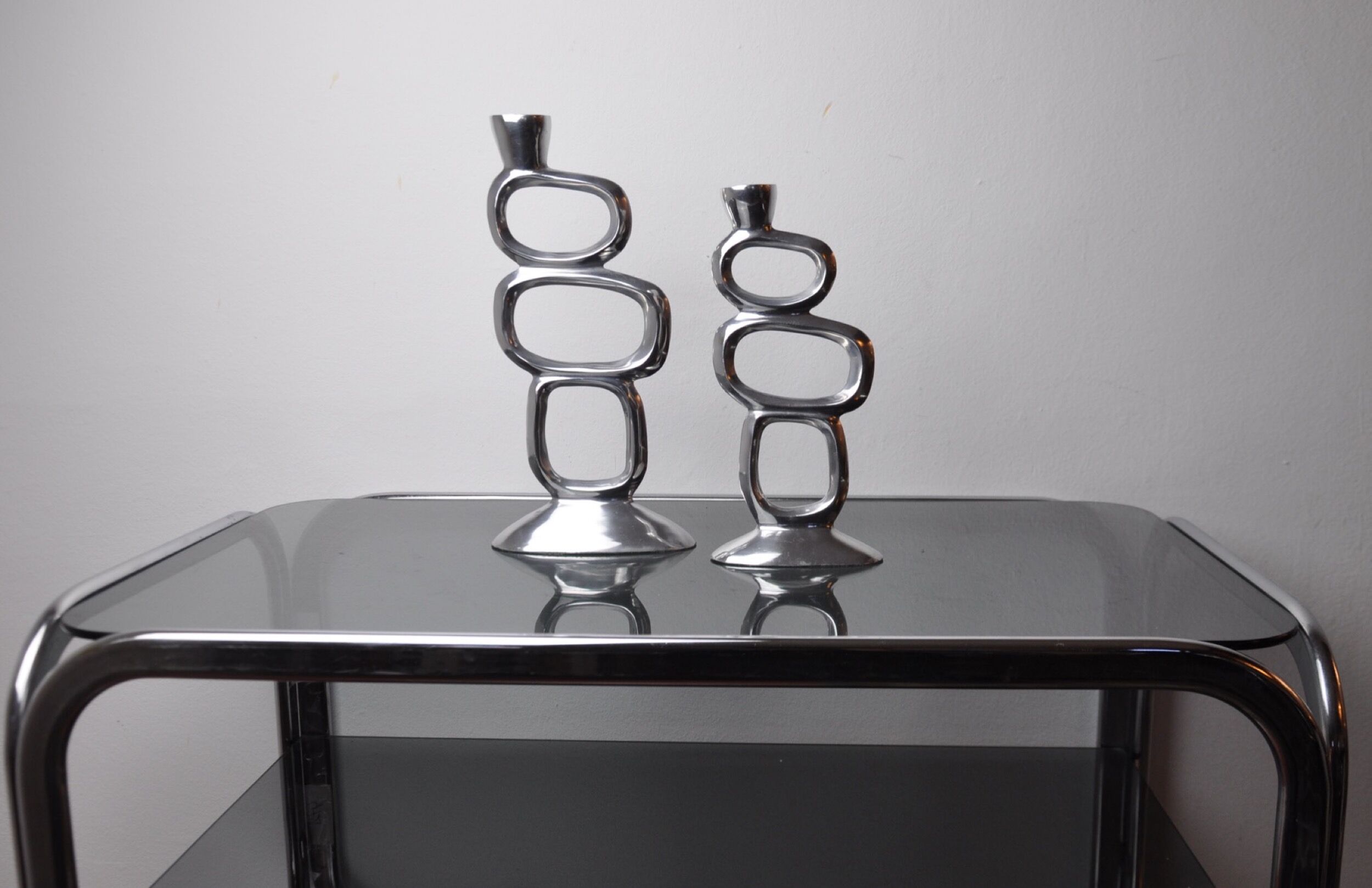 Pair of circle candlesticks by Matthew Hilton, England, 1980