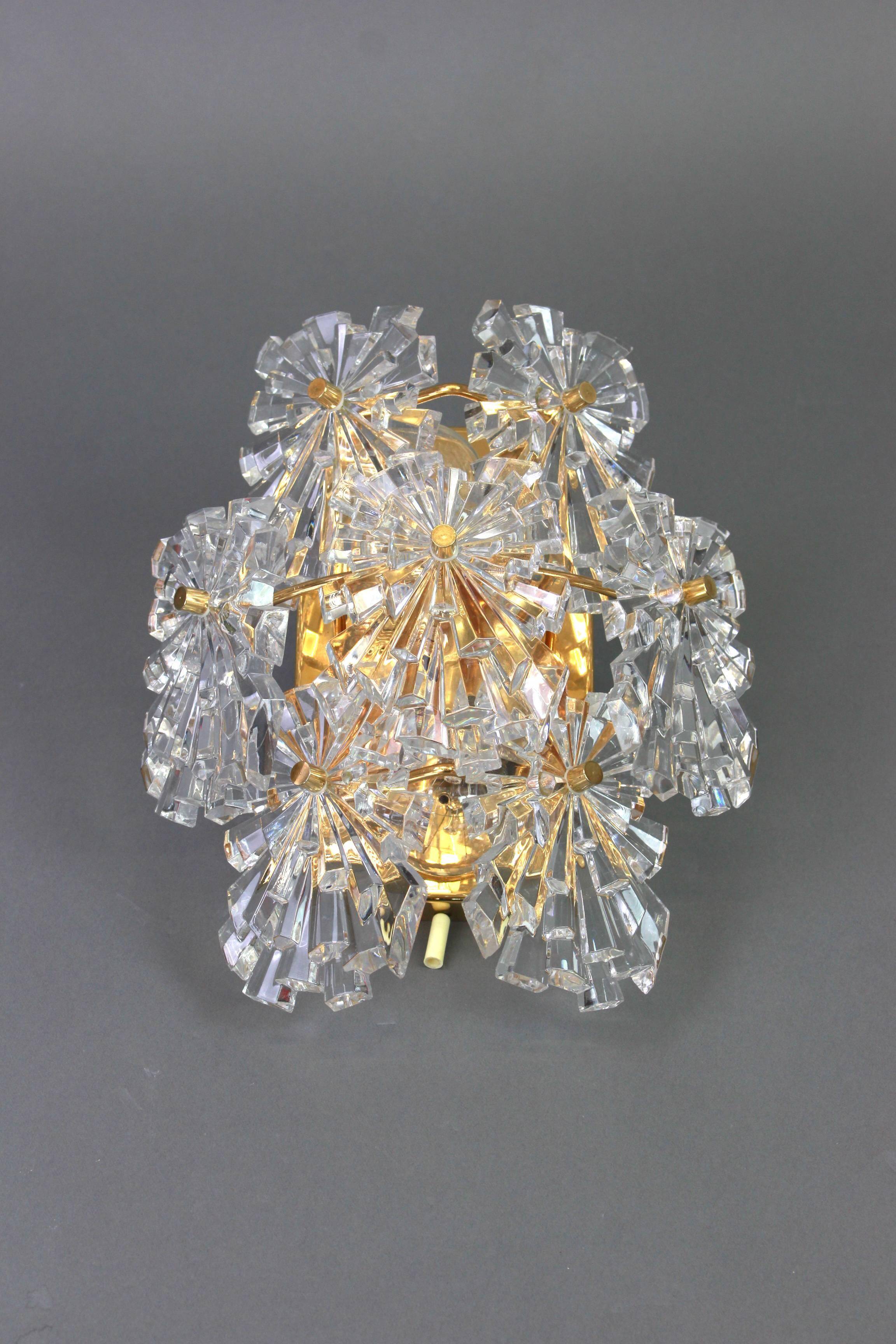 Magnificent pair of crystal wall lights by Kinkeldey, Germany, 1970s.