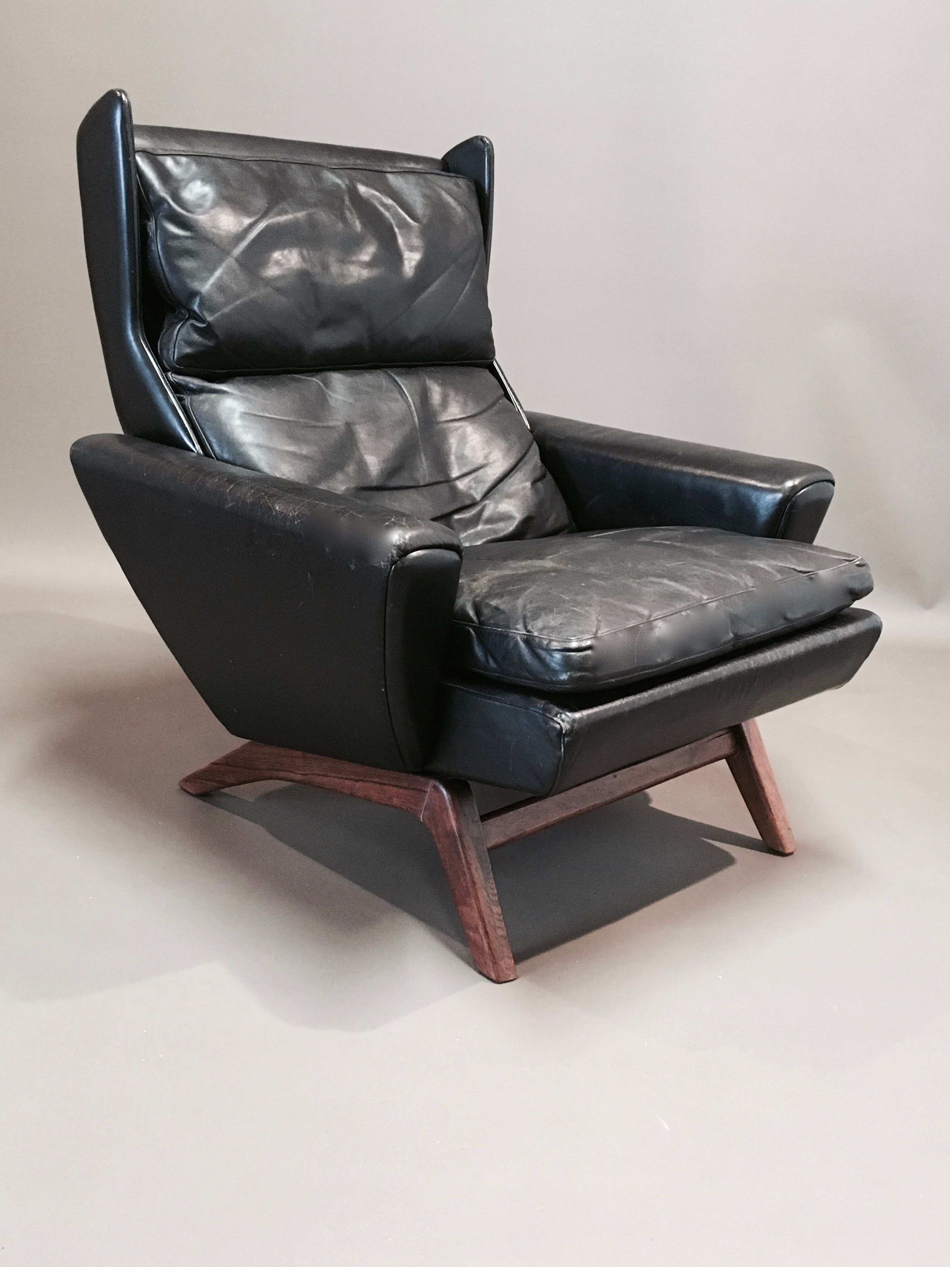 Rosewood armchair and black leather scandinavian 1950