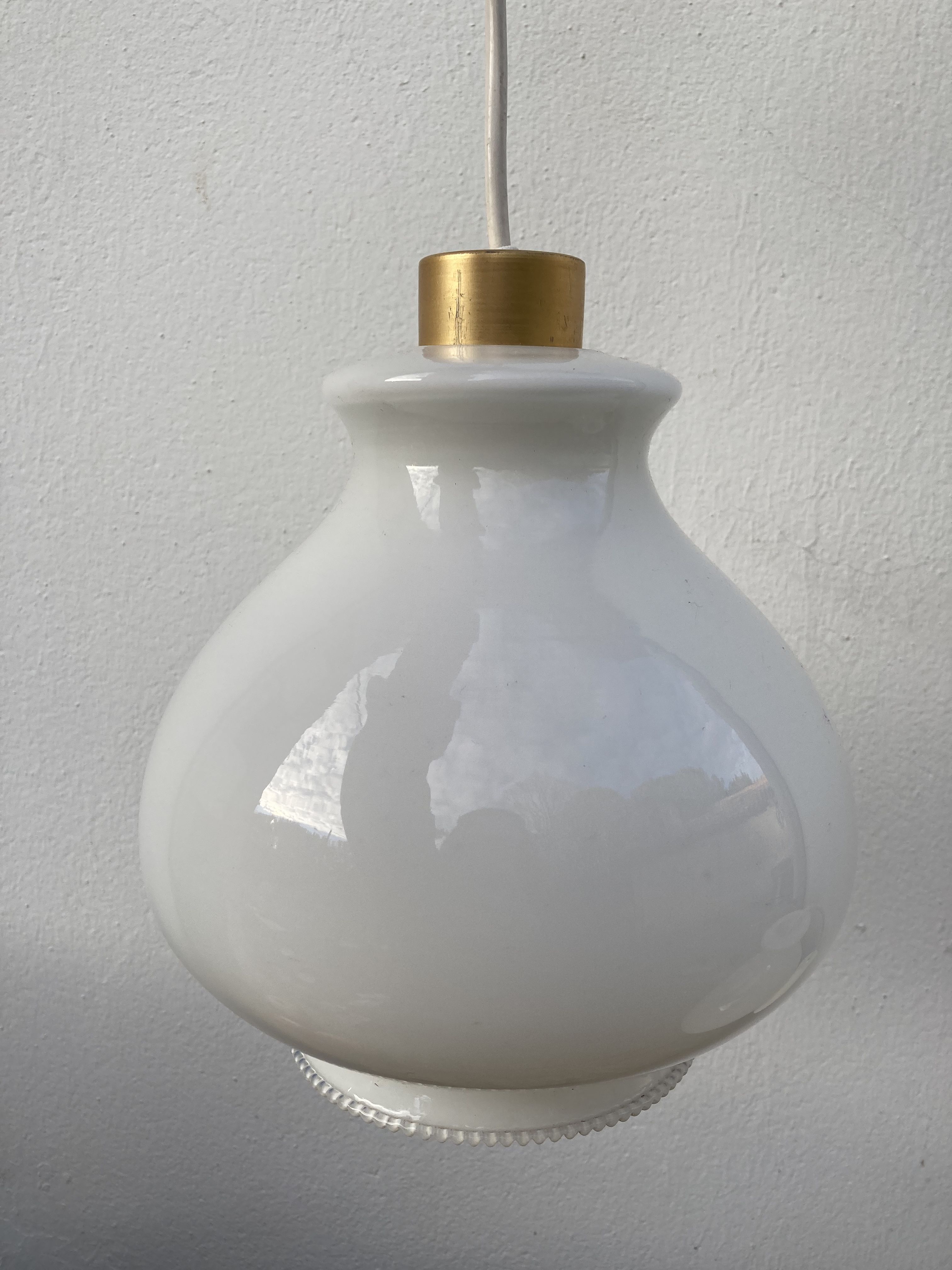 Pair of vintage white glass pendant lamp in the shape of a vintage globe