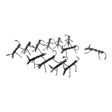 Brutalist zoomorphic knife rests