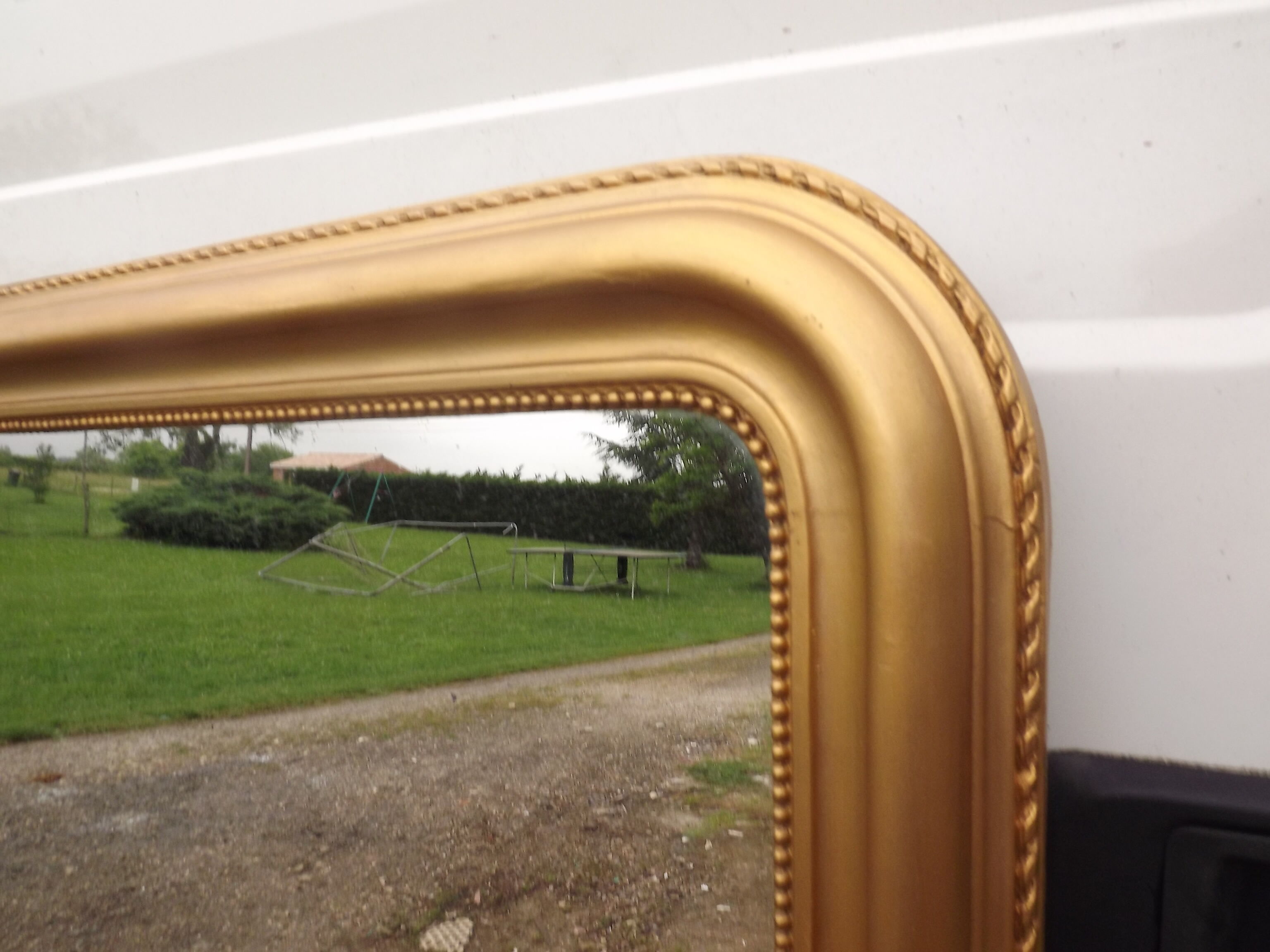 Golden mirror XlXth wood and stuk