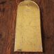 Rounded brass mirror