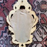 Golden mirror in baroque style.