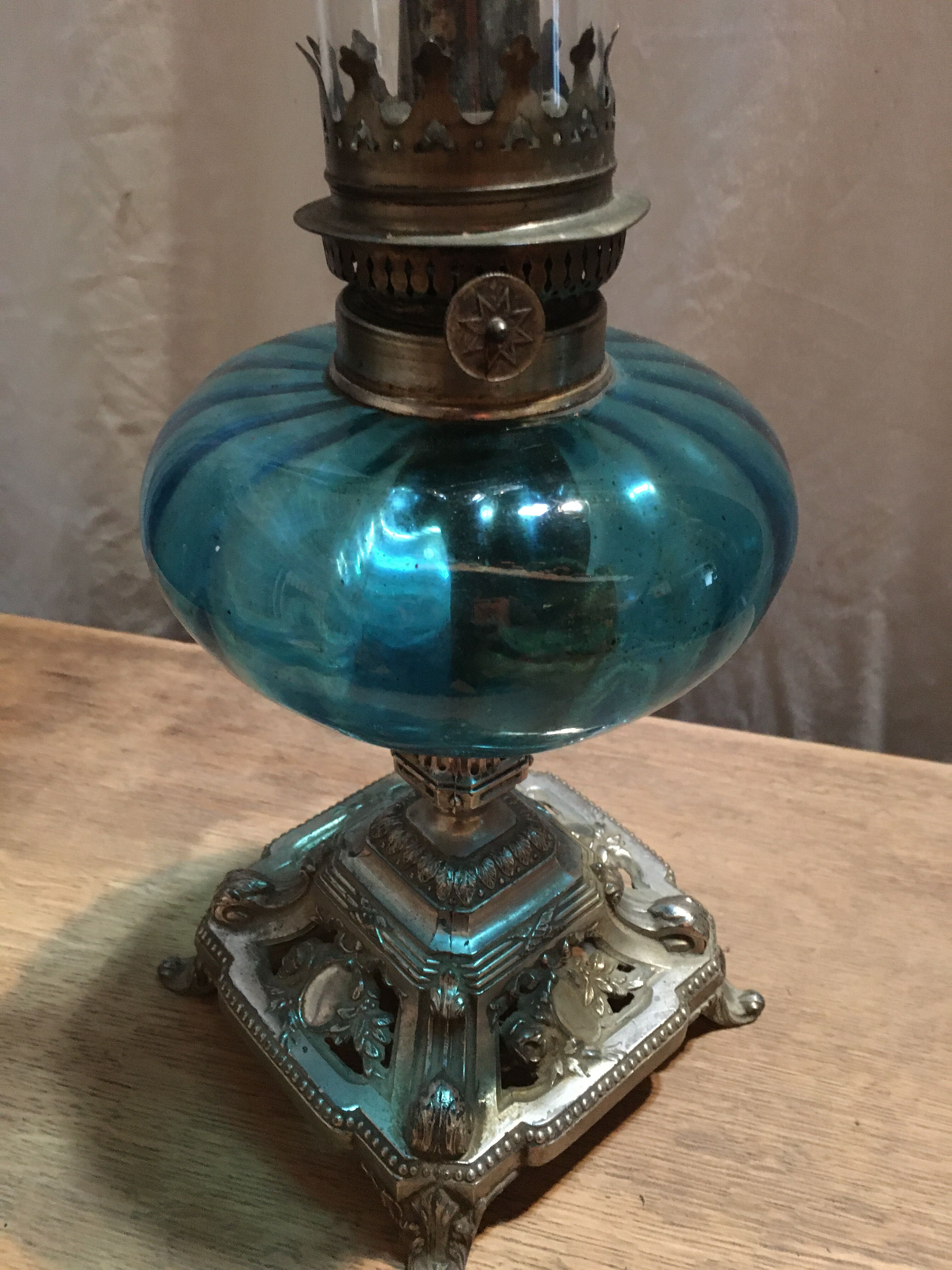 Blue oil lamp and metal foot