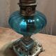 Blue oil lamp and metal foot