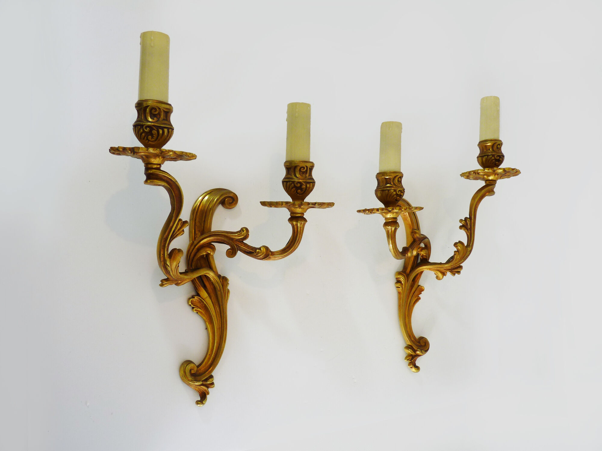 Former pair of double-light wall light in bronze or brass. Year 50 60