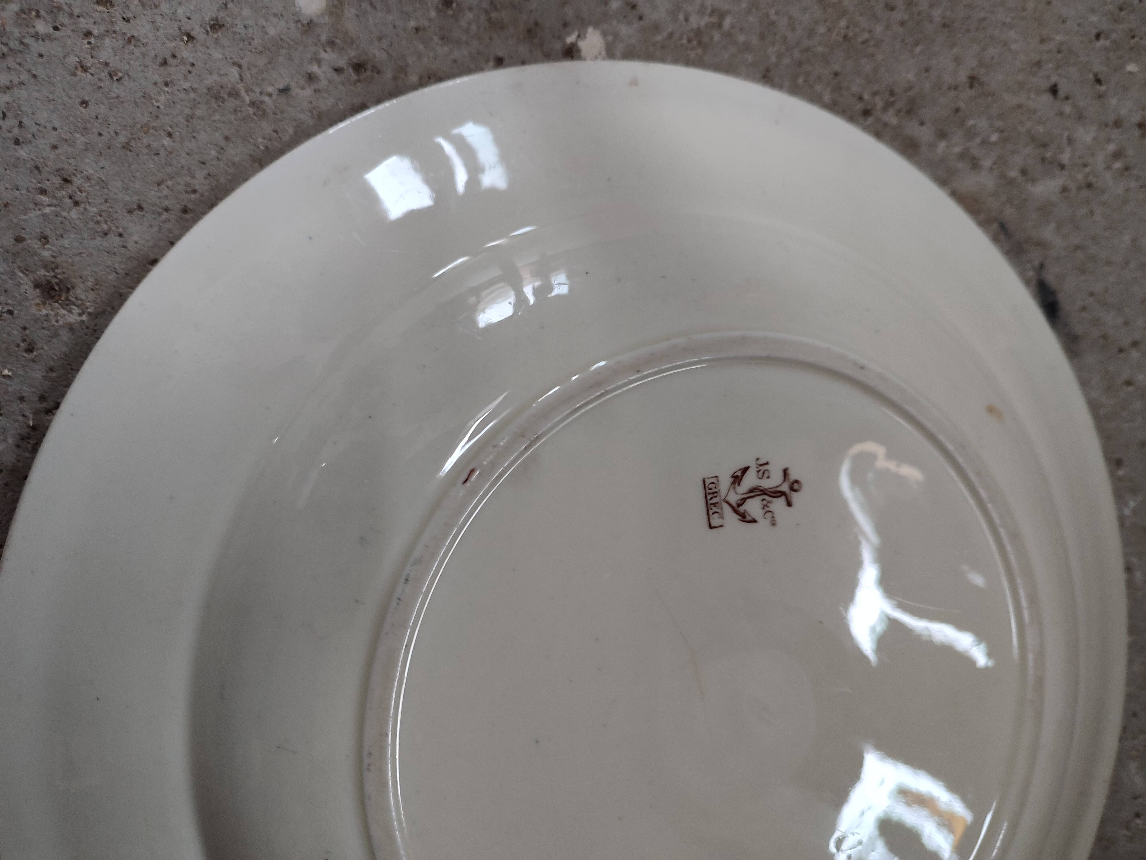 Old iron earth serving dish