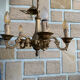 Elegant antique bronze chandelier with 5 light arms, in Louis XV style.