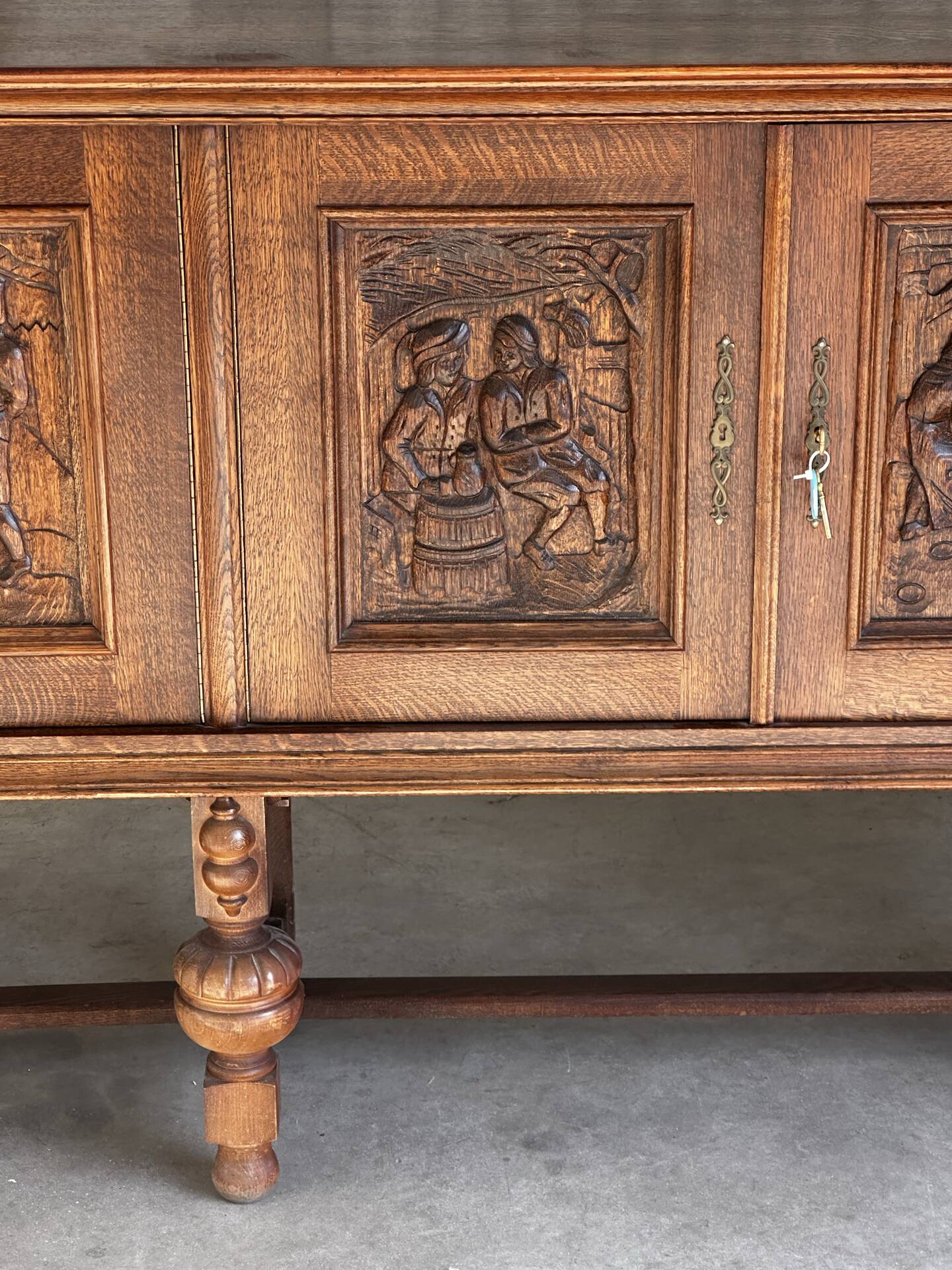 Large carved oak buffet in neo-Renaissance style, mid-20th century.
