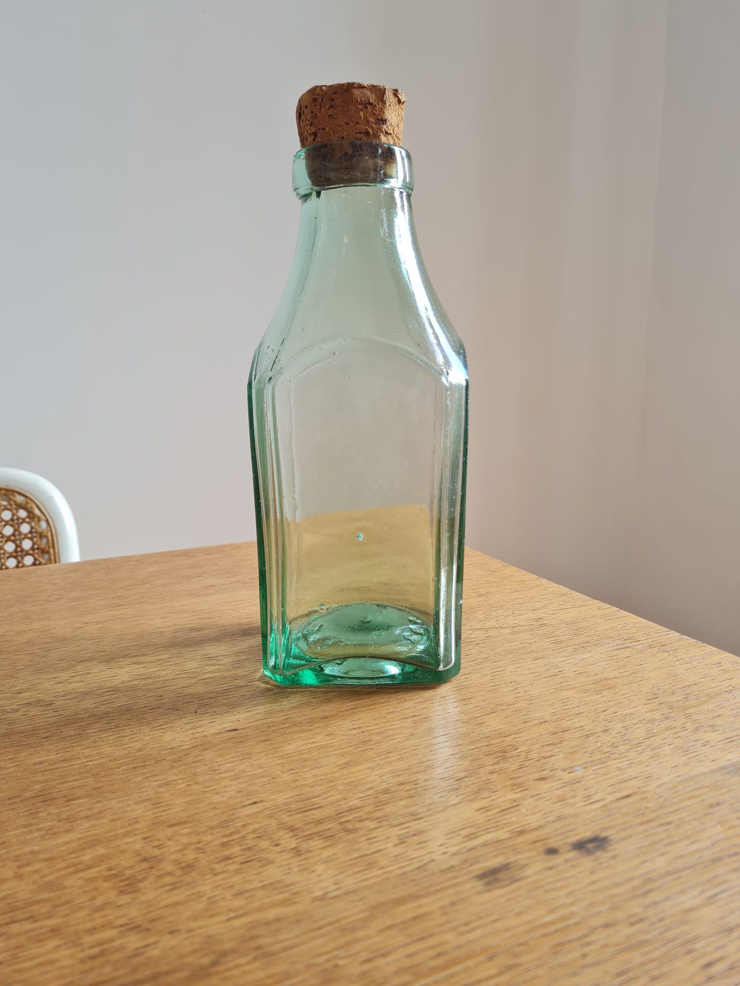 Green blown glass bottle
