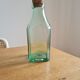 Green blown glass bottle