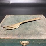 Box of forks in silver metal