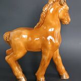Ceramic horse sculpture with wild glaze and gold, signed Art Deco.
