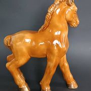 Ceramic horse sculpture with wild glaze and gold, signed Art Deco.
