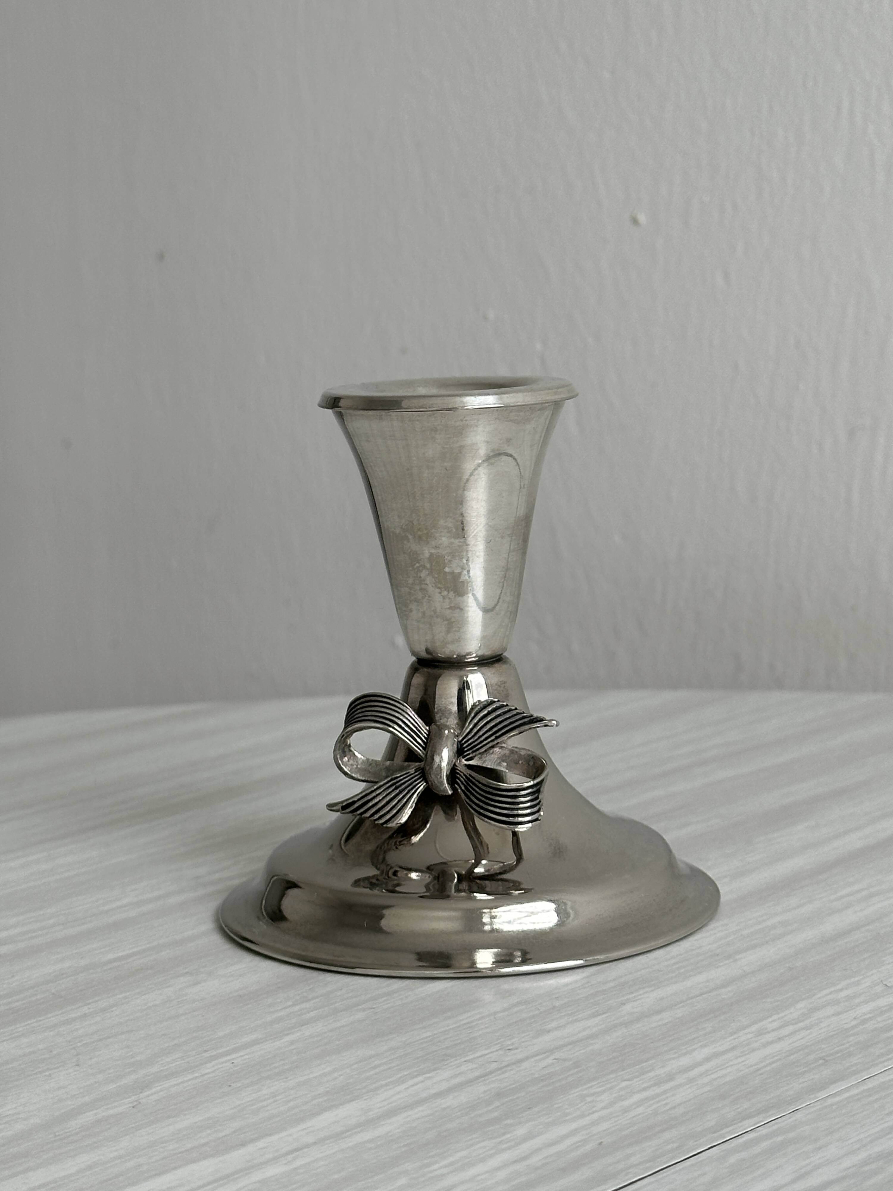 Vintage silver light metal candle holder